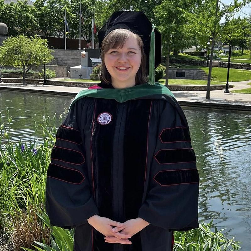 RARE Scholars program alumni Olivia Cummings in her medical school graduation gown